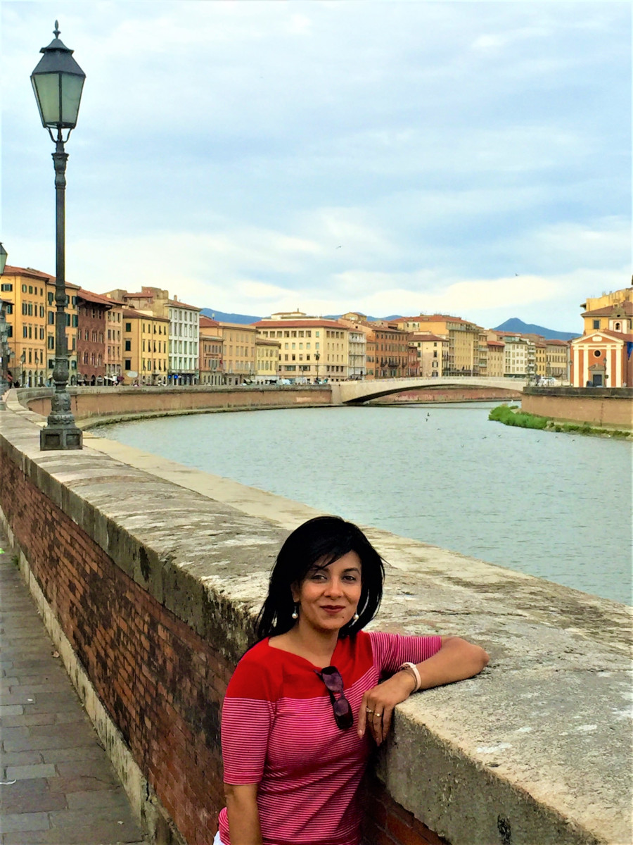 Strolling along the Arno River in Pisa, Italy