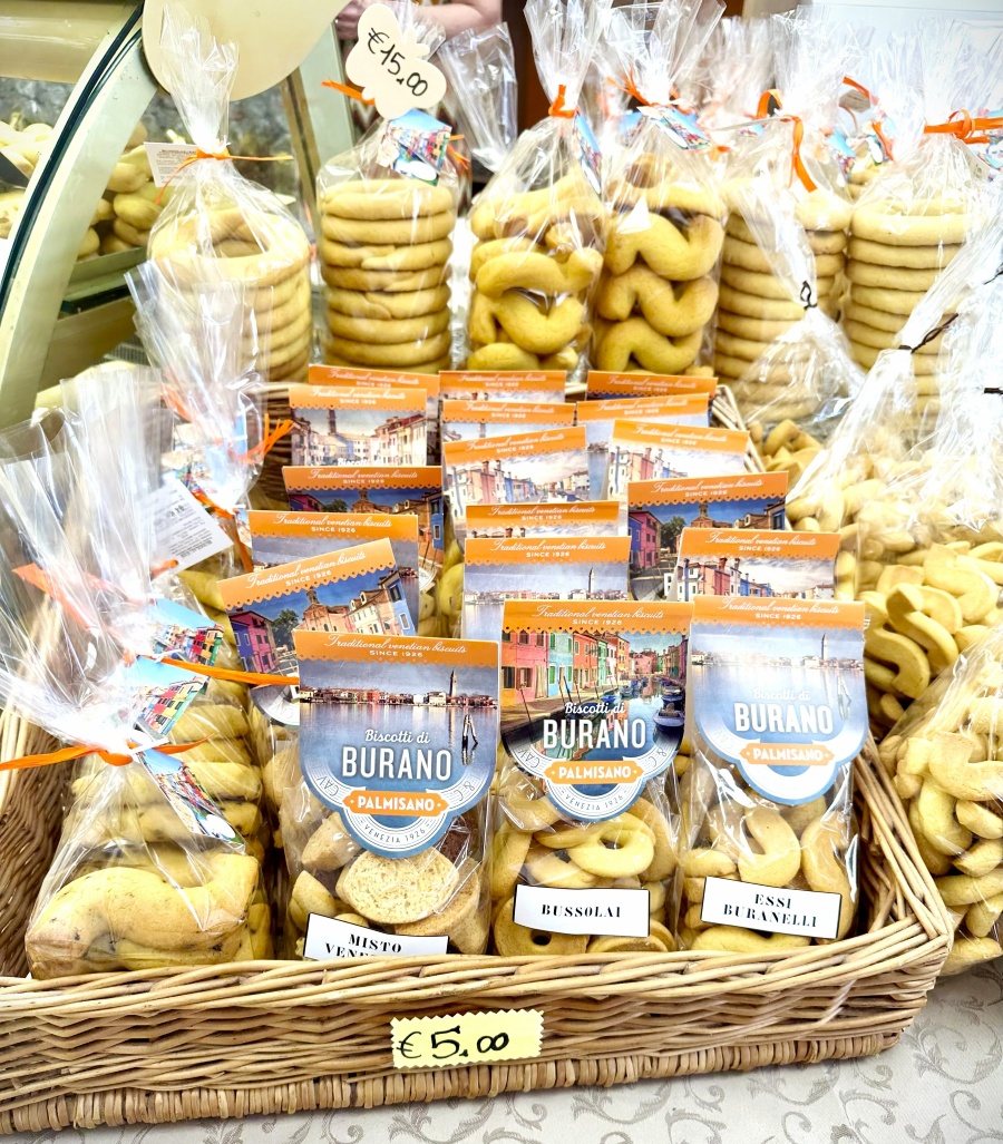 Traditional Burano cookies Bussolà and Esses displayed at Panificio Pasticceria Palmisano Carmelina bakery in Burano, Italy