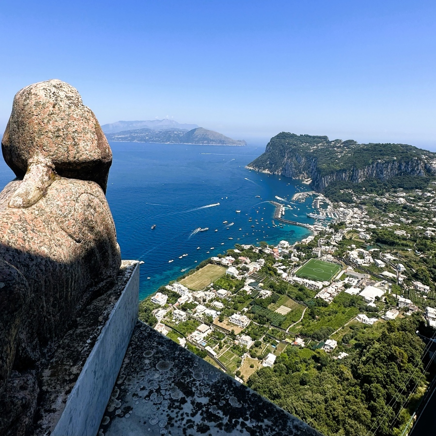 View of Marina Grande and the coastline of Capri from the Sphinx terrace at Villa San Michele in Anacapri.