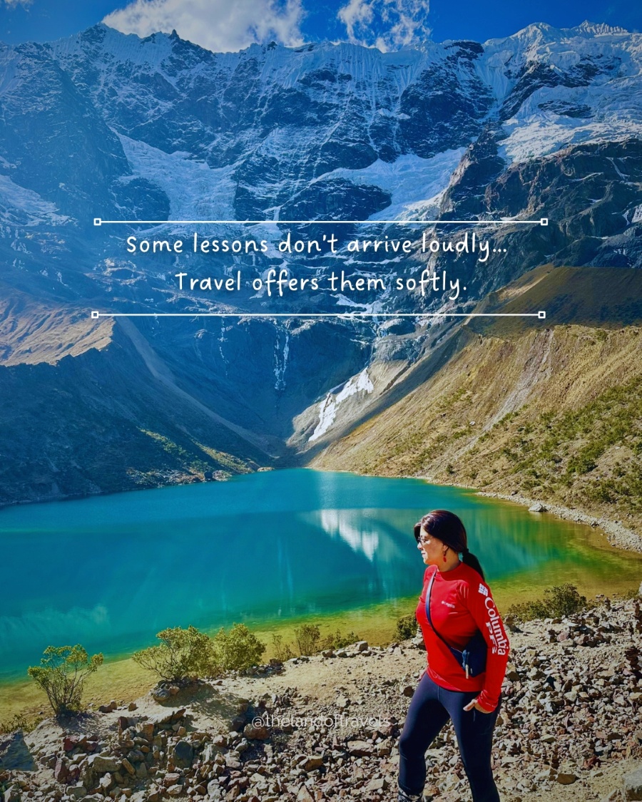Turquoise andean lake surrounded by mountains during a quiet moment of reflection while traveling